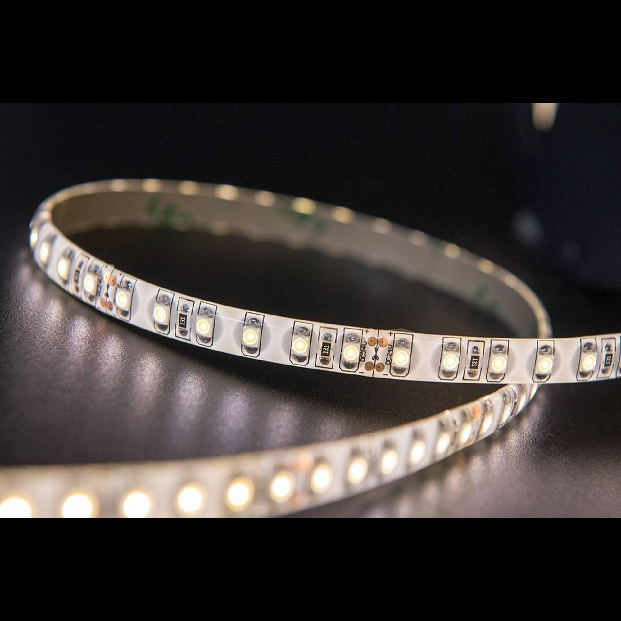 Лента светодиодная стандарт SMD2835 120LED/м 9,6Вт/м 24В IP65 Цвет:Теплый белый (1метр) 3М SWG